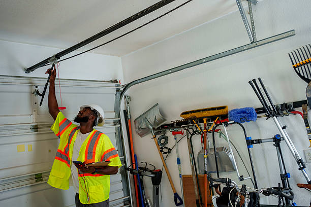 Professional Garage Door Panel Replacement technician working in Fisher, IL